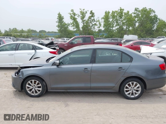 2012 Volkswagen Jetta SE z VIN 3VWDP7AJ2CM009780, wystawiony jako IAAI lot #42501489 z przebiegiem 122 185 mil mil oraz . Historia ofert i sprzedaży dostępna na DreamBid. Obrazek 13.