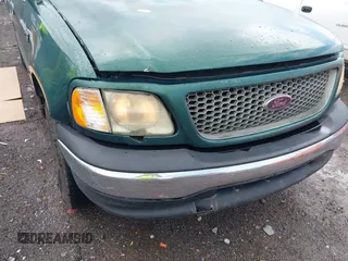 1999 Ford F-150 с VIN 1FTZX1729XNA84770, выставлен на аукционе IAAI как лот 42104198 с пробегом Не указан миль и . История ставок и продаж доступна на DreamBid. Изображение 6.