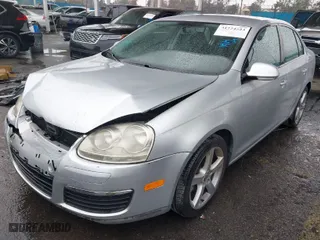 2009 Volkswagen Jetta Sedan S with VIN 3VWJZ71K29M148712, listed as a IAAI auction lot 41724523 with 112,043 mi miles. Bid and sale history available at carsss.com. Image 2.