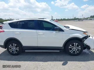 2017 Toyota RAV4 LE with VIN JTMZFREV2HJ711557, listed as a IAAI auction lot 41894094 with 167,645 mi miles. Bid and sale history available at carsss.com. Image 14.