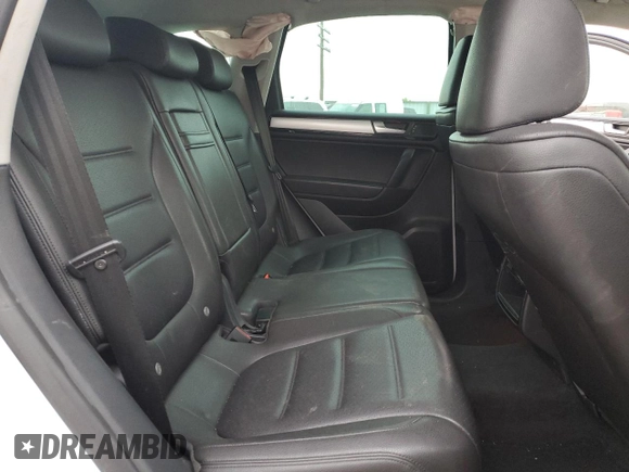 2014 Volkswagen Touareg Sport with VIN WVGEF9BP3ED005921, listed as a Copart auction lot 77372514 with 156,753 mi miles and Salvage Title. Bid and sale history available at DreamBid. Image 11.