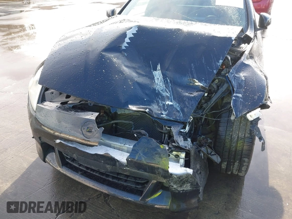 2012 Nissan 370Z Touring with VIN JN1AZ4EH4CM561303, listed as a IAAI auction lot 41788638 with 111,958 mi miles. Bid and sale history available at carsss.com. Image 6.