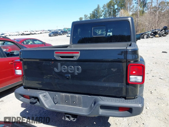 2023 Jeep Gladiator Sport S z VIN 1C6HJTAG8PL528821, wystawiony jako IAAI lot #41777653 z przebiegiem 65 656 mil mil oraz . Historia ofert i sprzedaży dostępna na DreamBid. Obrazek 16.