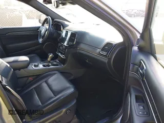 2020 Jeep Grand Cherokee Overland with VIN 1C4RJFCG8LC158475, listed as a IAAI auction lot 40665109 with 77,233 mi miles. Bid and sale history available at carsss.com. Image 5.