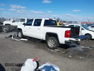 2017 GMC Sierra 1500 SLE z VIN 3GTP1MEC4HG332553, wystawiony jako IAAI lot #41721263 z przebiegiem 172 724 mil mil oraz . Historia ofert i sprzedaży dostępna na DreamBid. Obrazek 3.