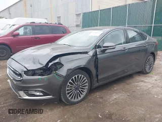 2017 Ford Fusion Titanium with VIN 3FA6P0K96HR208757, listed as a IAAI auction lot 42400172 with 90,000 mi miles and . Bid and sale history available at DreamBid. Image 17.