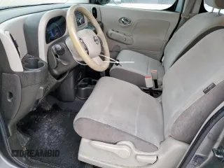 2010 Nissan Cube S z VIN JN8AZ2KR9AT166104, wystawiony jako Copart lot #55290045 z przebiegiem 147 372 mil mil oraz Szkoda całkowita • Salvage title. Historia ofert i sprzedaży dostępna na DreamBid. Obrazek 7.