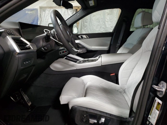2025 BMW X6 xDrive40i with VIN 5UX33EX0XS9Z57353, listed as a Copart auction lot 50839665 with 1,758 mi miles and Clean Title. Bid and sale history available at carsss.com. Image 7.