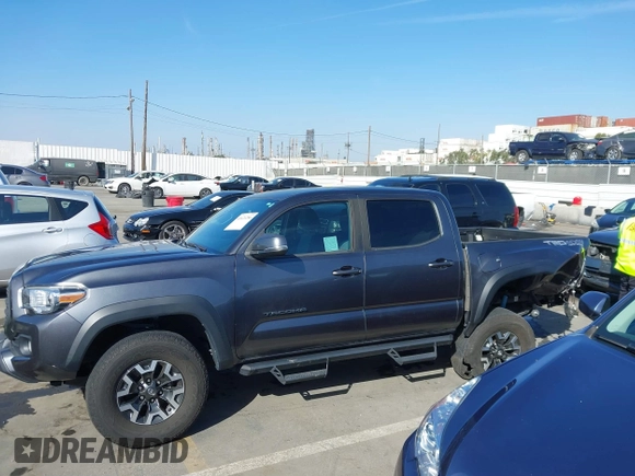 2020 Toyota Tacoma SR5 with VIN 3TMCZ5AN2LM351472, listed as a IAAI auction lot 41621286 with 48,402 mi miles and . Bid and sale history available at DreamBid. Image 14.