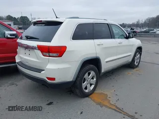 2011 Jeep Grand Cherokee Laredo with VIN 1J4RS4GG2BC709861, listed as a IAAI auction lot 41570812 with 178,226 mi miles and . Bid and sale history available at DreamBid. Image 4.