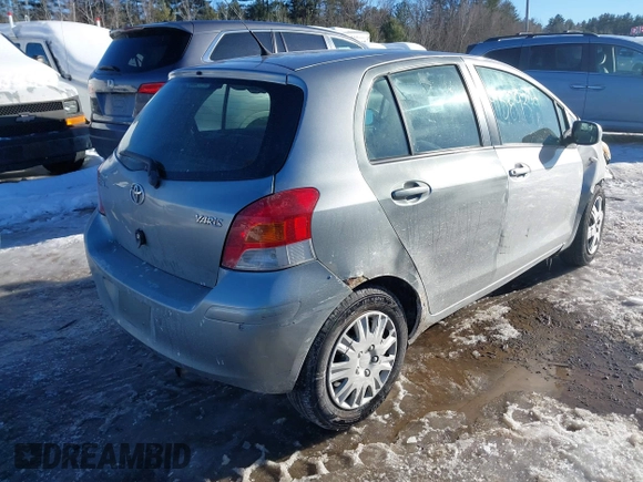 2010 Toyota Yaris with VIN JTDKT4K32A5293998, listed as a IAAI auction lot 41635631 with 221,414 mi miles. Bid and sale history available at carsss.com. Image 4.