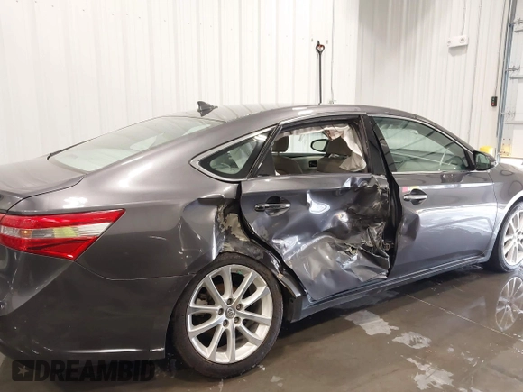 2014 Toyota Avalon Limited with VIN 4T1BK1EBXEU114134, listed as a IAAI auction lot 41727586 with 117,592 mi miles and . Bid and sale history available at DreamBid. Image 6.