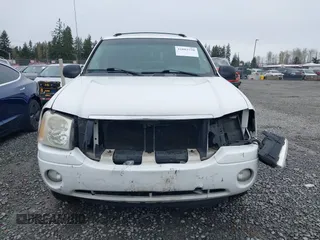 2009 GMC Envoy SLE with VIN 1GKDS33S892108589, listed as a IAAI auction lot 41883738 with 172,027 mi miles. Bid and sale history available at carsss.com. Image 12.