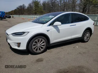 2016 Tesla Model X 70D z VIN 5YJXCAE21GF005015, wystawiony jako Copart lot #53778945 z przebiegiem 150 767 mil mil oraz Szkody całkowita. Historia ofert i sprzedaży dostępna na DreamBid. Obrazek 1.