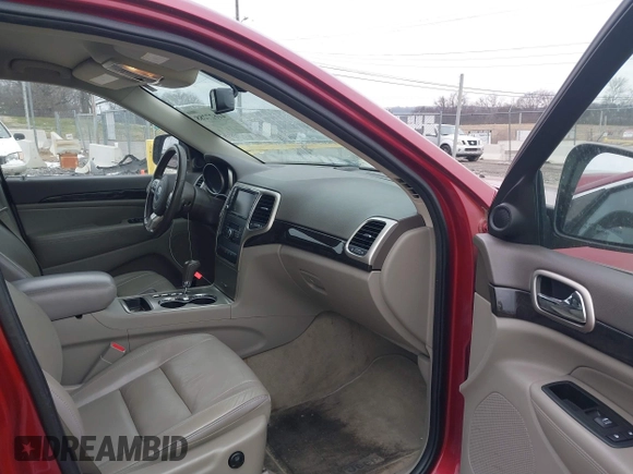 2013 Jeep Grand Cherokee Laredo with VIN 1C4RJEAG4DC573971, listed as a IAAI auction lot 41627288 with 143,256 mi miles. Bid and sale history available at carsss.com. Image 5.