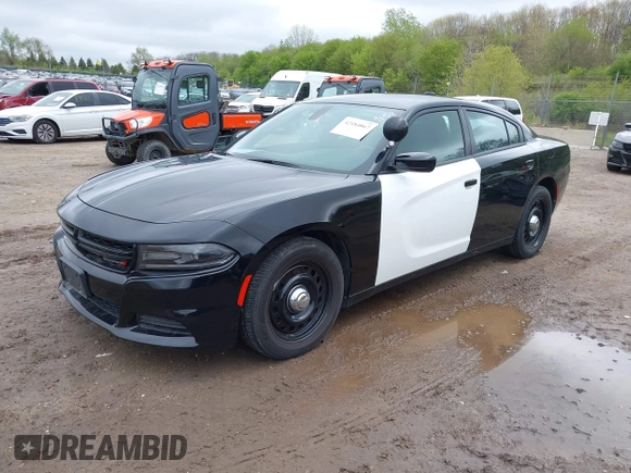 2018 Dodge Charger Police with VIN 2C3CDXKT4JH323762, listed as a IAAI auction lot 42184867 with 107,575 mi miles and . Bid and sale history available at carsss.com. Image 18.