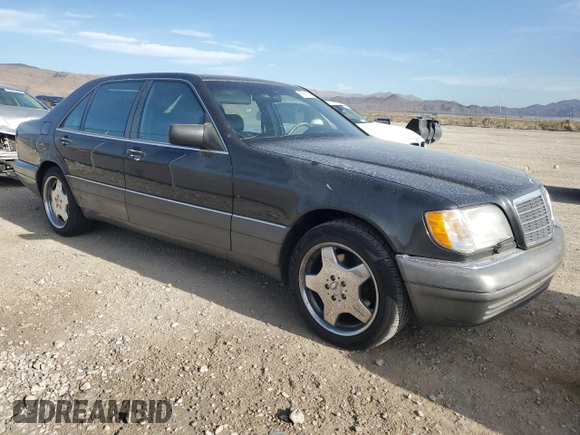 1995 Mercedes-Benz S with VIN WDBGA43E9SA233994, listed as a Copart auction lot 65867264 with 655,674 mi miles and Salvage Title. Bid and sale history available at DreamBid. Image 4.
