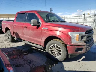 2019 Ford F-150 XL with VIN 1FTEW1EP2KKD26969, listed as a Copart auction lot 46751235 with 133,712 mi miles and Salvage Title. Bid and sale history available at carsss.com. Image 4.