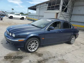 2006 Jaguar X-Type with VIN SAJWA51A66WE94483, listed as a Copart auction lot 67514114 with 104,215 mi miles and Salvage Title. Bid and sale history available at DreamBid. Image 1.