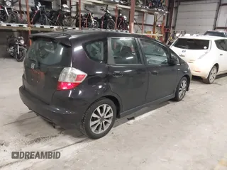 2013 Honda Fit Sport z VIN JHMGE8H56DC019556, wystawiony jako IAAI lot #41140755 z przebiegiem Nie podano mil oraz . Historia ofert i sprzedaży dostępna na DreamBid. Obrazek 4.