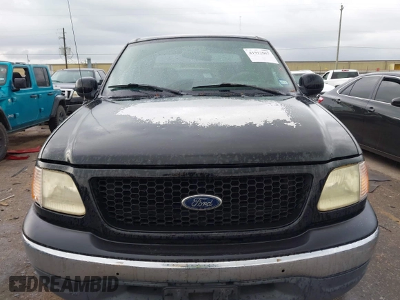 2003 Ford F-150 XLT with VIN 1FTRW07623KD67409, listed as a IAAI auction lot 41912067 with Not Provided miles. Bid and sale history available at carsss.com. Image 6.