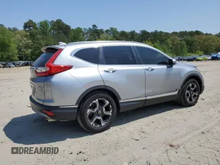 2018 Honda CR-V Touring with VIN 7FARW1H9XJE001467, listed as a Copart auction lot 55222005 with 65,611 mi miles and Salvage title. Bid and sale history available at DreamBid. Image 3.