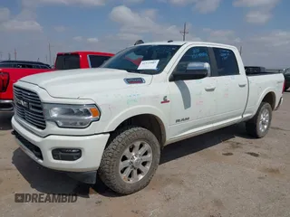 2022 Ram 2500 Laramie with VIN 3C6UR5FL0NG143918, listed as a IAAI auction lot 42373907 with 91,918 mi miles and . Bid and sale history available at DreamBid. Image 19.