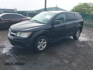 2009 Dodge Journey SXT z VIN 3D4GG57V39T503436, wystawiony jako IAAI lot #42275559 z przebiegiem 136 403 mil mil oraz . Historia ofert i sprzedaży dostępna na DreamBid. Obrazek 2.