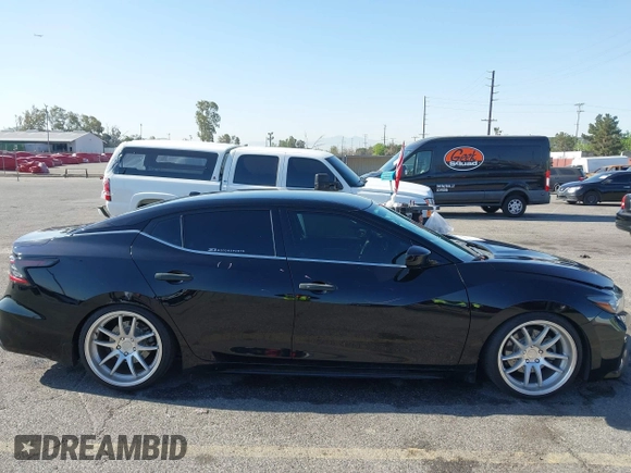 2019 Nissan Maxima SV with VIN 1N4AA6AV0KC379040, listed as a IAAI auction lot 42003805 with 53,724 mi miles and . Bid and sale history available at DreamBid. Image 13.