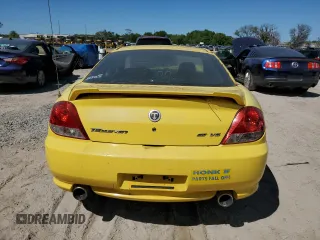 2006 Hyundai Tiburon GT z VIN KMHHN65F96U203308, wystawiony jako Copart lot #47278684 z przebiegiem 186 123 mil mil oraz Szkoda całkowita • Salvage title. Historia ofert i sprzedaży dostępna na DreamBid. Obrazek 6.