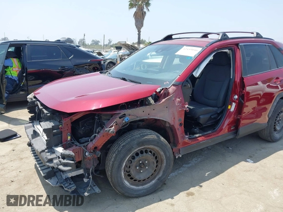 2019 Toyota RAV4 LE with VIN JTMK1RFV4KD025587, listed as a IAAI auction lot 42459046 with 73,852 mi miles and . Bid and sale history available at DreamBid. Image 6.