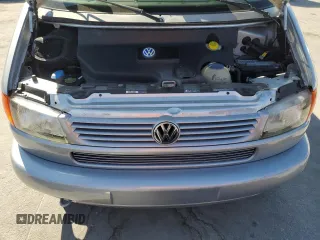 2002 Volkswagen EuroVan с VIN WV2KB47012H065431, выставлен на аукционе Copart как лот 49010445 с пробегом 78 985 миль миль и Чистый • Clean title. История ставок и продаж доступна на DreamBid. Изображение 12.