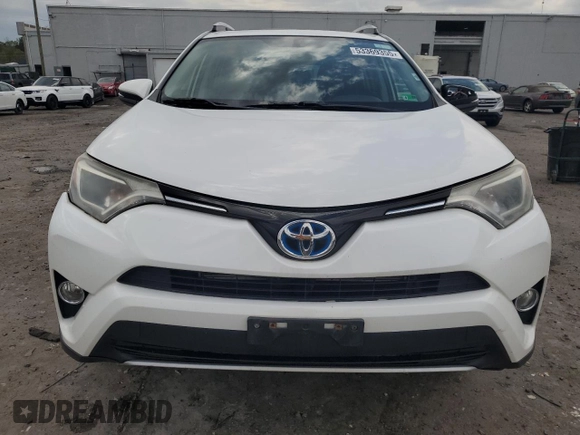 2016 Toyota RAV4 Hybrid XLE with VIN JTMRJREV0GD017557, listed as a Copart auction lot 53369355 with 271,066 mi miles and Salvage Title. Bid and sale history available at carsss.com. Image 5.
