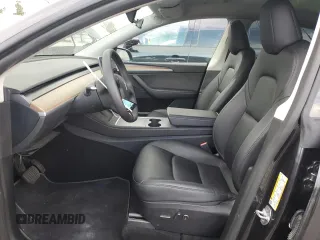 2024 Tesla Model Y with VIN 7SAYGDED1RF052031, listed as a Copart auction lot 48507865 with 5,365 mi miles and Salvage title. Bid and sale history available at DreamBid. Image 7.