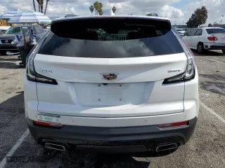 2023 Cadillac XT4 FWD Sport with VIN 1GYFZER48PF219325, listed as a Copart auction lot 45513335 with 6,561 mi miles and Salvage Title. Bid and sale history available at carsss.com. Image 6.