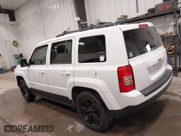 2014 Jeep Patriot Latitude with VIN 1C4NJPFB8ED717749, listed as a IAAI auction lot 41962155 with 147,755 mi miles and . Bid and sale history available at carsss.com. Image 14.