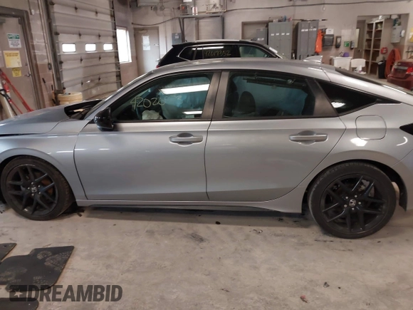 2023 Honda Civic Sport with VIN 19XFL2H80PE010679, listed as a IAAI auction lot 42026973 with 25,701 mi miles and . Bid and sale history available at DreamBid. Image 14.