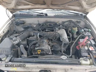 2000 Toyota Tacoma z VIN 5TEVL52N4YZ717158, wystawiony jako IAAI lot #42223643 z przebiegiem 180 515 mil mil oraz . Historia ofert i sprzedaży dostępna na DreamBid. Obrazek 10.