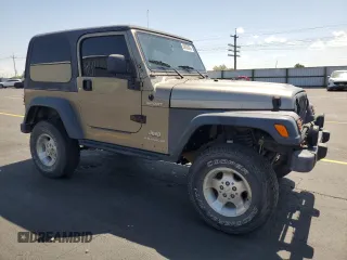 2003 Jeep Wrangler Sport z VIN 1J4FA49S43P327283, wystawiony jako Copart lot #59036295 z przebiegiem 158 108 mil mil oraz Szkoda całkowita • Salvage title. Historia ofert i sprzedaży dostępna na DreamBid. Obrazek 4.