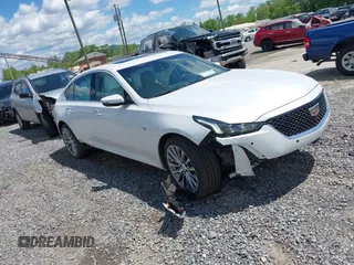 2021 Cadillac CT5 Premium Luxury z VIN 1G6DT5RW5M0143287, wystawiony jako IAAI lot #42181225 z przebiegiem 42 404 mil mil oraz . Historia ofert i sprzedaży dostępna na DreamBid. Obrazek 1.