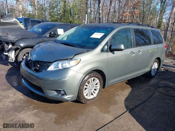2012 Toyota Sienna XLE AAS with VIN 5TDYK3DC8CS254057, listed as a IAAI auction lot 41853010 with 84,351 mi miles. Bid and sale history available at carsss.com. Image 2.