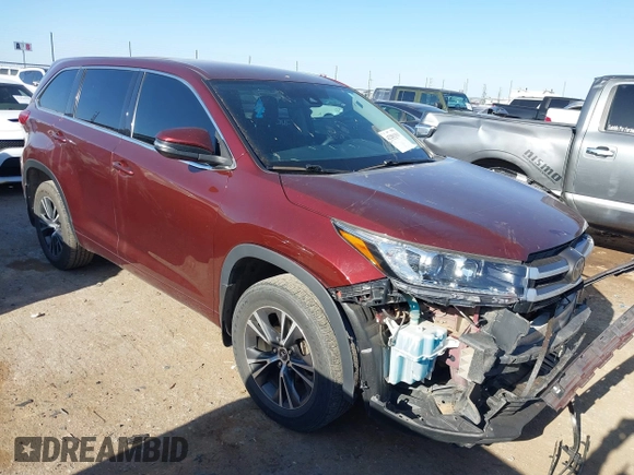 2018 Toyota Highlander LE with VIN 5TDZARFH0JS036002, listed as a IAAI auction lot 42281311 with 106,714 mi miles and . Bid and sale history available at DreamBid. Image 1.