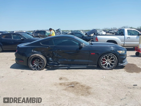 2015 Ford Mustang GT z VIN 1FA6P8CF1F5327142, wystawiony jako IAAI lot #41909056 z przebiegiem 105 798 mil mil oraz . Historia ofert i sprzedaży dostępna na DreamBid. Obrazek 13.