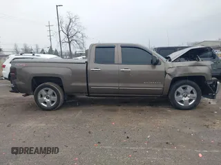 2015 Chevrolet Silverado 1500 LT with VIN 1GCVKREC9FZ237338, listed as a IAAI auction lot 41897225 with 154,229 mi miles and . Bid and sale history available at DreamBid. Image 13.