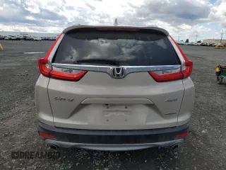 2018 Honda CR-V Touring with VIN 5J6RW2H98JL002657, listed as a Copart auction lot 55075965 with 61,327 mi miles and Salvage Title. Bid and sale history available at DreamBid. Image 6.
