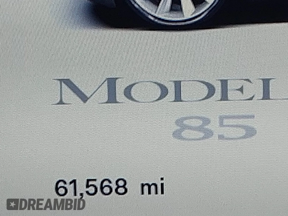 2013 Tesla Model S with VIN 5YJSA1CN0DFP20053, listed as a IAAI auction lot 41470660 with 61,568 mi miles and . Bid and sale history available at DreamBid. Image 16.