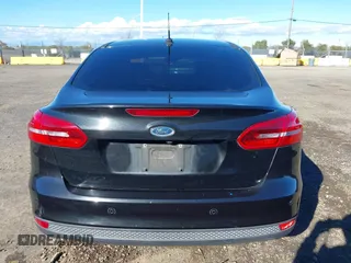 2015 Ford Focus SE with VIN 1FADP3F21FL262033, listed as a IAAI auction lot 41521714 with 101,890 mi miles. Bid and sale history available at carsss.com. Image 16.