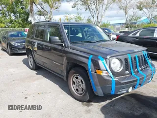 2015 Jeep Patriot Sport with VIN 1C4NJPBB5FD348985, listed as a IAAI auction lot 41035027 with 146,903 mi miles. Bid and sale history available at carsss.com. Image 1.