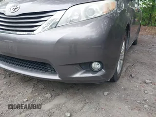 2011 Toyota Sienna XLE AAS with VIN 5TDYK3DC8BS016319, listed as a IAAI auction lot 42186294 with 293,401 mi miles and . Bid and sale history available at DreamBid. Image 6.