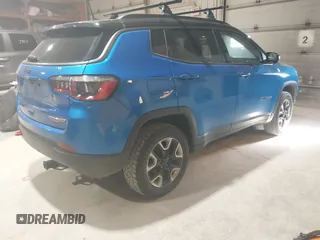 2018 Jeep Compass Trailhawk with VIN 3C4NJDDB3JT234529, listed as a IAAI auction lot 41973123 with 173,559 mi miles and . Bid and sale history available at DreamBid. Image 4.